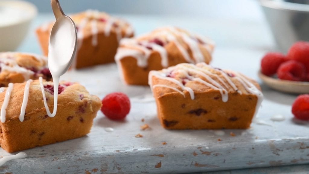 Video test of raspberry cake being iced and roast beef basted.
