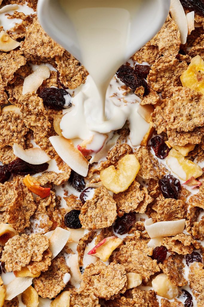 tesco fruit fibre cereal with milk pouring on