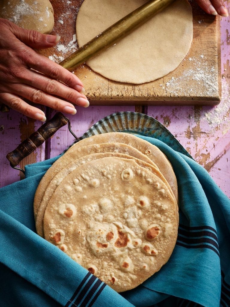 rolling rotis chapattis cooking indian food