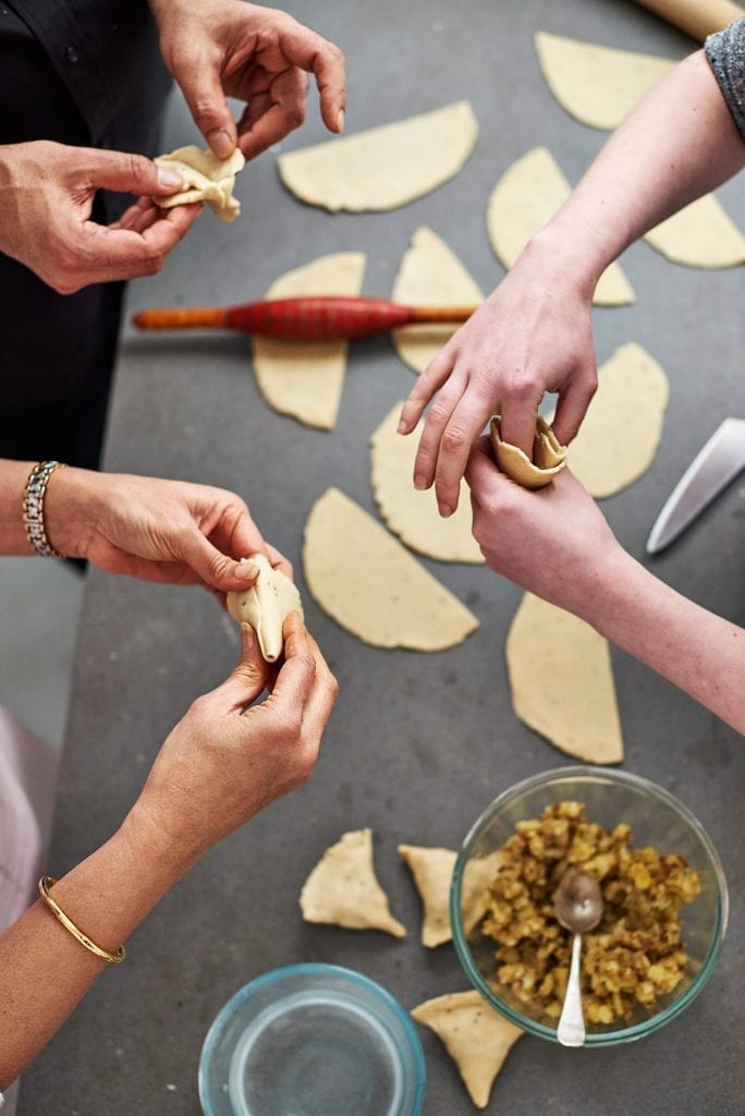 Samosas being prepared for Monisha Bharadwaj's Indian Cookery Course book by Kyle books