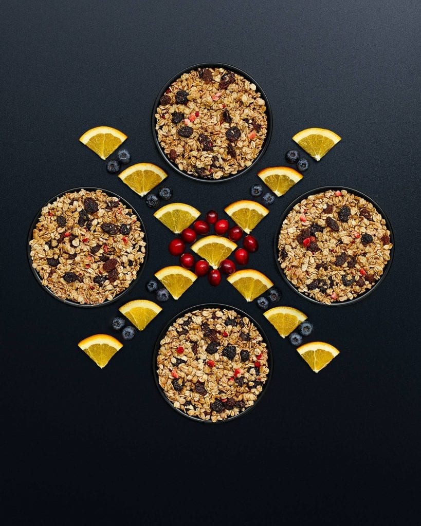 M&S Bowls of granola with oranges, blueberries and cranberries. Shot for Marks and Spencer.