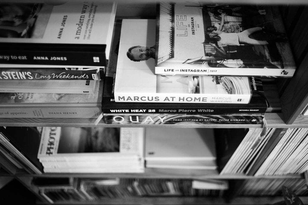 various food recipe books on shelves at gareth morgans food photography studio